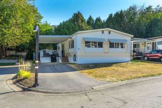 Photo 1: 39 13507 81 Avenue in Surrey: Queen Mary Park Surrey Manufactured Home for sale in "Park Boulevard Estates" : MLS®# R2727845