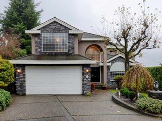 Photo 1: 9 GREYSTONE Place in Port Moody: Heritage Mountain House for sale in "Heritage Mountain" : MLS®# R2257446