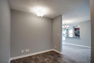 Photo 2: 9413 403 Mackenzie Way SW: Airdrie Apartment for sale : MLS®# A1201272