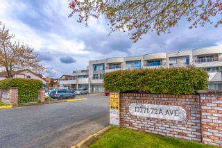 Photo 1: 201 13771 72A Avenue in Surrey: East Newton Condo for sale in "New Town Plaza" : MLS®# R2707654