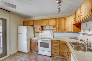 Photo 6: 74 Strathcona Crescent SW in Calgary: Strathcona Park Semi Detached for sale : MLS®# A1241887
