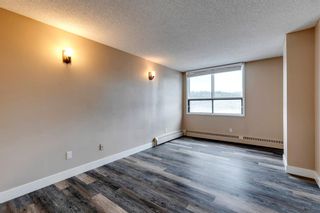 Photo 13: 906 145 Point Drive NW in Calgary: Point McKay Apartment for sale : MLS®# A1221429