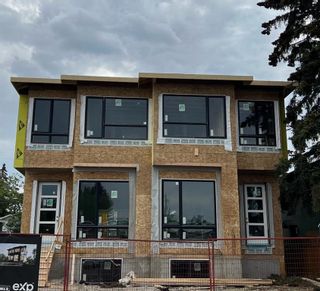 Main Photo: 455 30 Avenue NW in Calgary: Mount Pleasant Semi Detached (Half Duplex) for sale : MLS®# A2034941