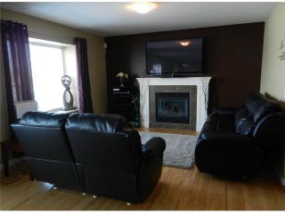 Photo 8: 557 LUXSTONE Landing SW: Airdrie Residential Detached Single Family for sale : MLS®# C3596256