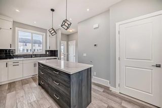 Photo 4: 71 Amblefield Avenue in Calgary: C-527 Detached for sale : MLS®# A2133965