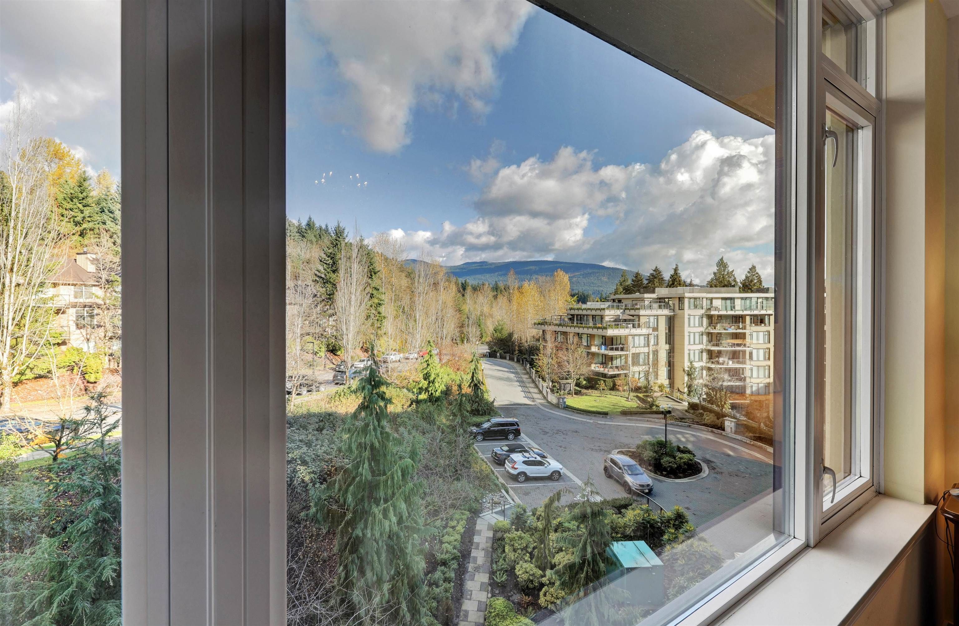 Photo 3: Photos: 806 2950 PANORAMA Drive in Coquitlam: Westwood Plateau Condo for sale in "The Cascades" : MLS®# R2633935