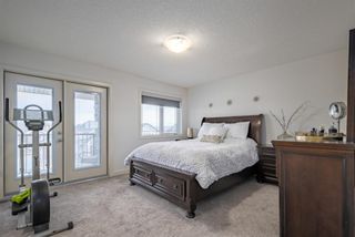 Photo 22: 129 Springbluff Boulevard SW in Calgary: Springbank Hill Detached for sale : MLS®# A2113789