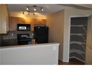 Photo 3: 159 BAYSIDE Point SW: Airdrie Townhouse for sale : MLS®# C3566247