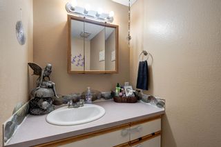 Photo 9: 2 123 Queensland Drive SE in Calgary: Queensland Row/Townhouse for sale : MLS®# A2010360