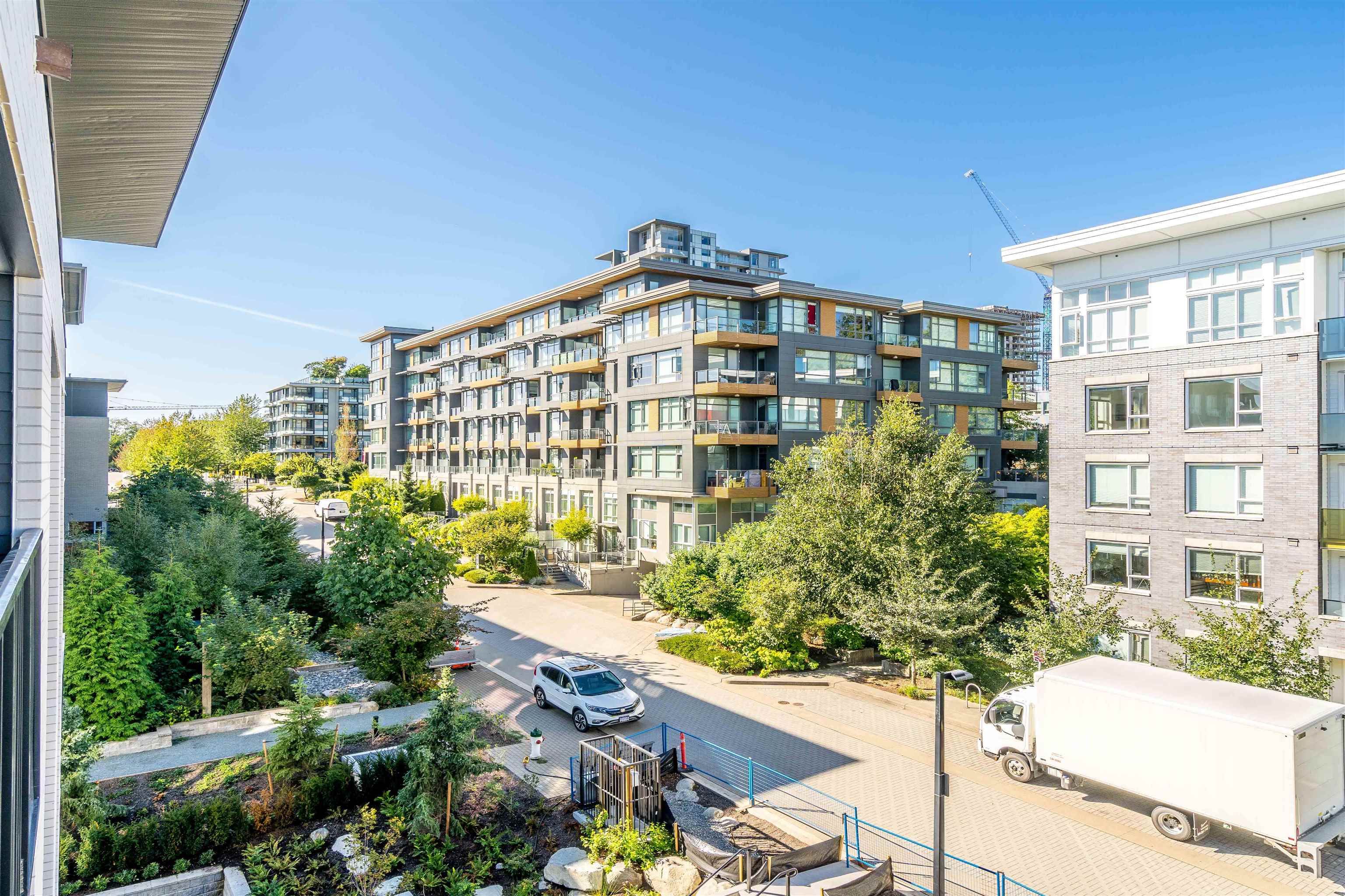 Main Photo: 404 9228 SLOPES Mews in Burnaby: Simon Fraser Univer. Condo for sale in "FRASER BY MOSAIC" (Burnaby North)  : MLS®# R2622126