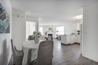 Photo 4: 2109 7451 Springbank Boulevard SW in Calgary: Springbank Hill Apartment for sale : MLS®# A2034205