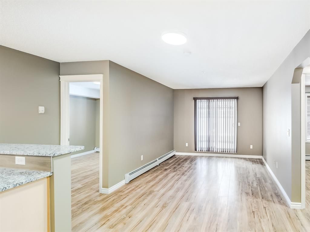 Main Photo: 4110 70 Panamount Drive NW in Calgary: Panorama Hills Apartment for sale : MLS®# A1056107