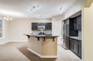 Photo 4: 323 Panamount Point NW in Calgary: Panorama Hills Detached for sale : MLS®# A1150248