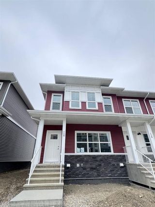 Photo 1: 128 Merganser Drive W: Chestermere Row/Townhouse for sale : MLS®# A2126197