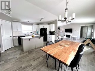 Photo 1: 147 Meadowplace Drive E in Brooks: House for sale : MLS®# A2030978