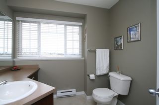 Photo 27: 24 6852 193RD Street in Surrey: Clayton Townhouse for sale in "INDIGO" (Cloverdale)  : MLS®# F1301220