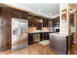 Photo 3: 2034 FRASER Avenue in Port Coquitlam: Glenwood PQ House for sale : MLS®# V1045215