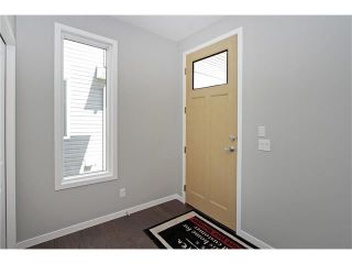 Photo 5: 158 WALGROVE Drive SE in Calgary: Walden House for sale : MLS®# C4075055