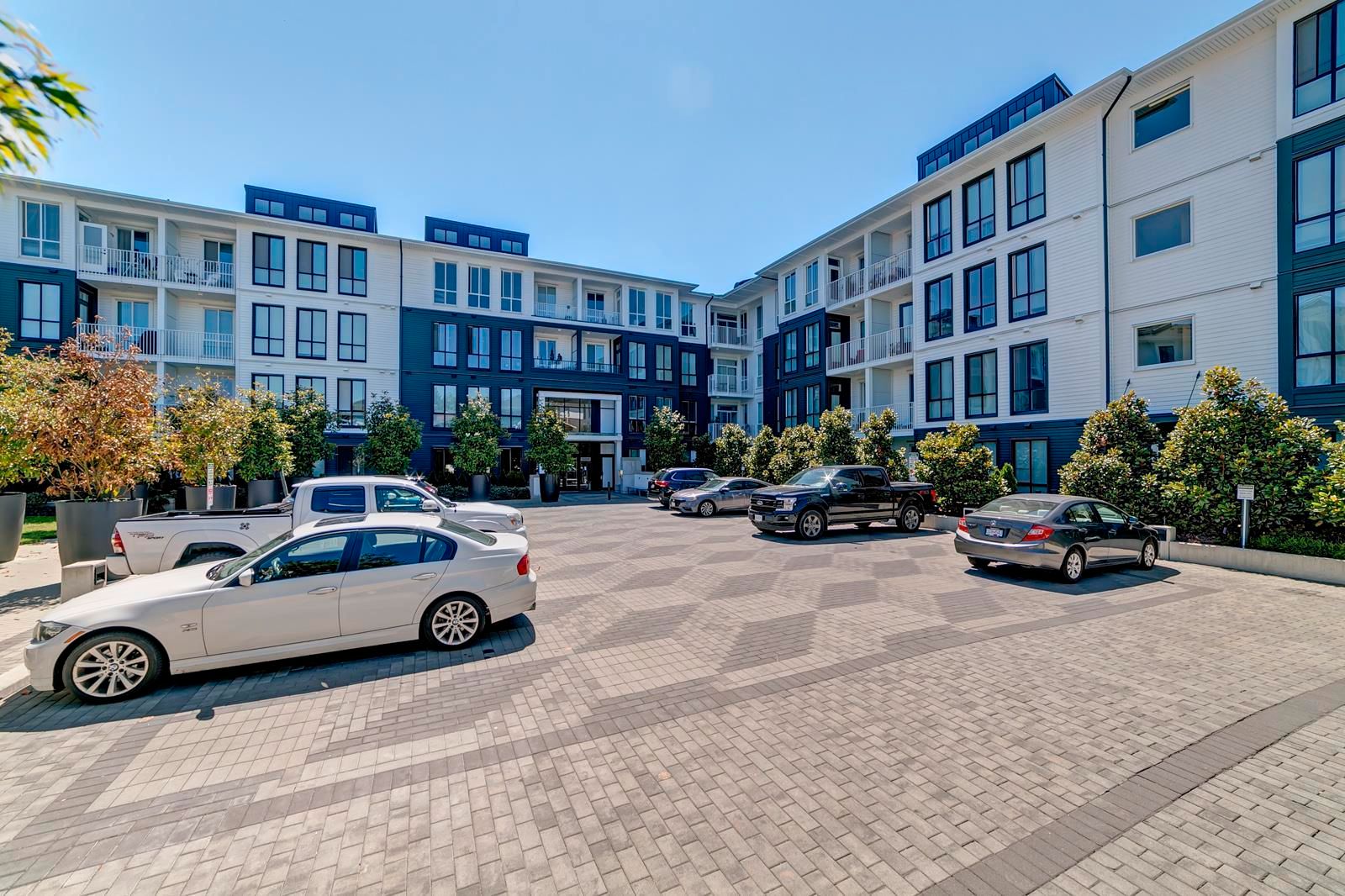 Main Photo: 328 14968 101A Avenue in Surrey: Guildford Condo for sale in "Mosaic Guildhouse" (North Surrey)  : MLS®# R2603317