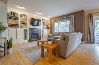 Photo 6: 95 Strathlea Place SW in Calgary: Strathcona Park Detached for sale : MLS®# A2060491