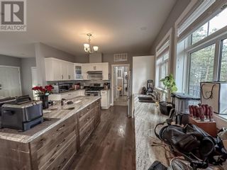 Photo 11: 7265 Dunwaters Drive in Kelowna: House for sale : MLS®# 10288662