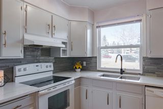 Photo 4: 56 330 Canterbury Drive SW in Calgary: Canyon Meadows Row/Townhouse for sale : MLS®# A1197871