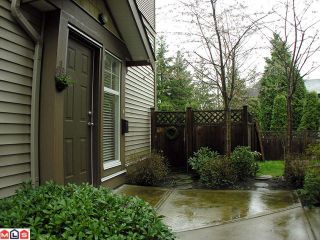 Photo 1: 11 6588 188th Street in Surrey: Cloverdale BC Townhouse for sale (Cloverdale)  : MLS®# F1208447