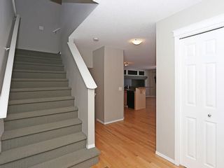 Photo 2: 89 SUNSET Heights: Cochrane House for sale : MLS®# C4177018