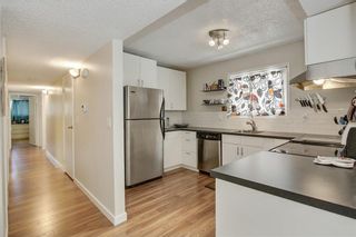 Photo 11: A 130 29 Avenue NW in Calgary: Tuxedo Park Row/Townhouse for sale : MLS®# A2081845
