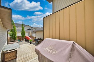 Photo 38: 126 Clydesdale Way: Cochrane Row/Townhouse for sale : MLS®# A2053332