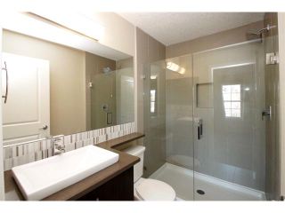 Photo 18: 334 ASCOT Circle SW in Calgary: Aspen Woods House for sale : MLS®# C4047112