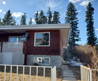Photo 2: 415 B Squirrel Street: Banff Semi Detached (Half Duplex) for sale : MLS®# A2031526