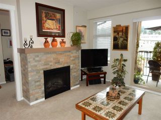 Photo 3: 411 500 KLAHANIE Drive in Port Moody: Port Moody Centre Condo for sale in "TIDES" : MLS®# R2025736