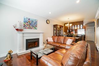 Photo 4: 110 3333 DEWDNEY TRUNK Road in Port Moody: Port Moody Centre Townhouse for sale : MLS®# R2571062