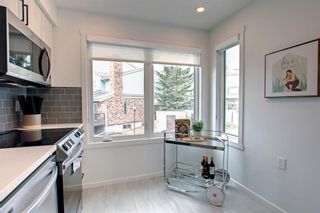 Photo 6: 14 Coachway Gardens SW in Calgary: Coach Hill Row/Townhouse for sale : MLS®# A1215253