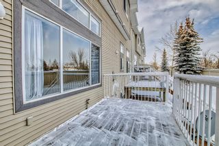 Photo 24: 80 Crystal Shores Cove: Okotoks Row/Townhouse for sale : MLS®# A2016287