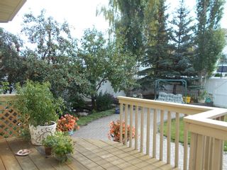 Photo 4: 128 Hawkland Circle NW in Calgary: Hawkwood Detached for sale : MLS®# A1182144