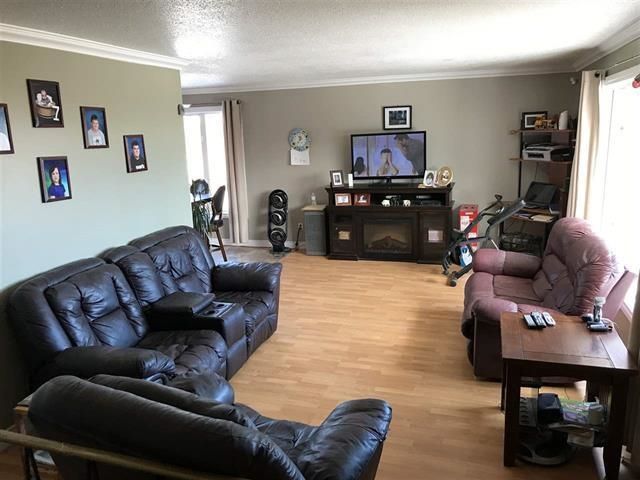 Photo 6: Photos: 5519 51 Street in Fort Nelson: Fort Nelson -Town House for sale in "HILL" (Fort Nelson (Zone 64))  : MLS®# R2634638