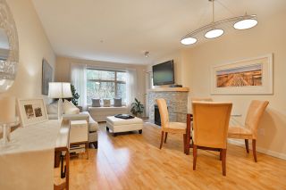 Photo 5: 102 400 KLAHANIE Drive in Port Moody: Port Moody Centre Condo for sale in "TIDES" : MLS®# R2013966