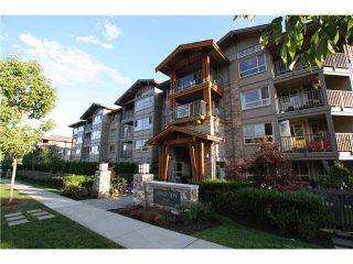 Photo 1: 309 3110 DAYANEE SPRINGS BL Boulevard in Coquitlam: Westwood Plateau Condo for sale : MLS®# V1097552