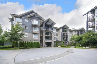 Photo 1: 104 2958 WHISPER WAY in Coquitlam: Westwood Plateau Condo for sale : MLS®# R2099902