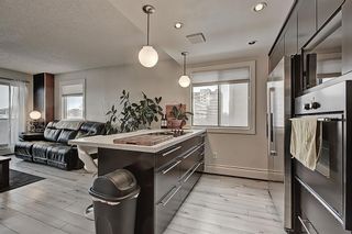 Photo 9: 404 235 15 Avenue SW in Calgary: Beltline Apartment for sale : MLS®# A2027875