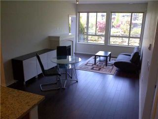 Photo 3: 114 3110 DAYANEE SPRINGS Boulevard in Coquitlam: Westwood Plateau Condo for sale in "LEDGEVIEW" : MLS®# V937259