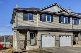 Photo 1: 50 Rockyvalley Villas NW in Calgary: Rocky Ridge Row/Townhouse for sale : MLS®# A2025923
