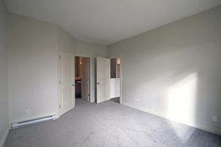 Photo 25: 144 1000 Glenhaven Way: Cochrane Semi Detached (Half Duplex) for sale : MLS®# A2010215