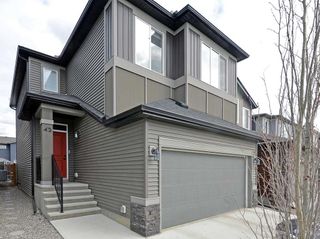 Photo 1: 42 Wolf Hollow Way SE in Calgary: C-281 Detached for sale : MLS®# A2124565
