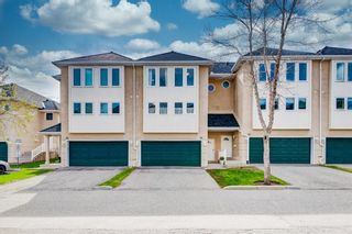Photo 2: 91 Candle Terrace SW in Calgary: Canyon Meadows Row/Townhouse for sale : MLS®# A1107122