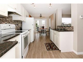 Photo 11: 81 COVEWOOD Close NE in Calgary: Coventry Hills House for sale : MLS®# C4014534