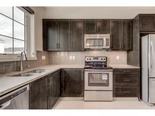 Photo 5: 28 Nolan Hill Gate NW in Calgary: Nolan Hill Row/Townhouse for sale : MLS®# A1192299