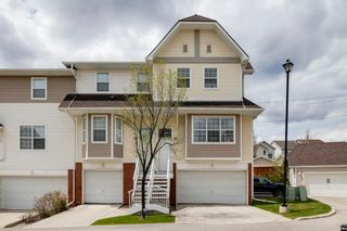 Photo 1: 127 Tuscany Springs Gardens NW in Calgary: Tuscany Row/Townhouse for sale : MLS®# A1216397